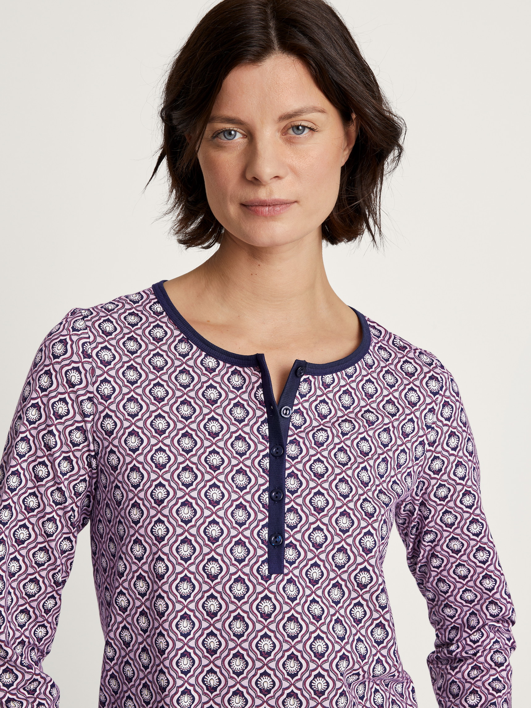 Women model is wearing Nightdress, length 100cm made of 100% Cotton in Purple, Floral from the Lovely Nights series by CALIDA, Detail