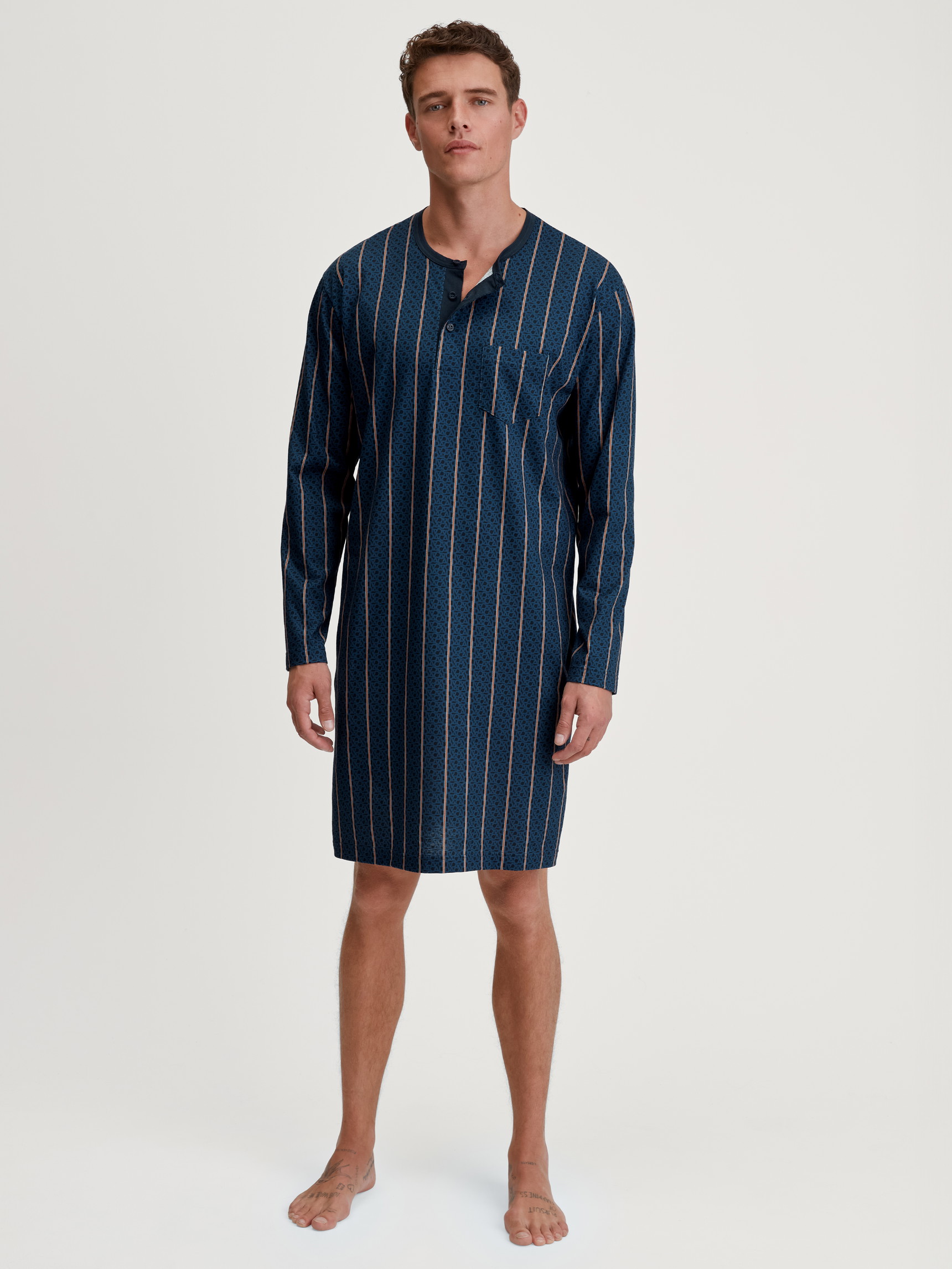 Men model is wearing Nightshirt made of 100% Cotton in Blue, Striped from the Relax Imprint 1 series by CALIDA, Front view