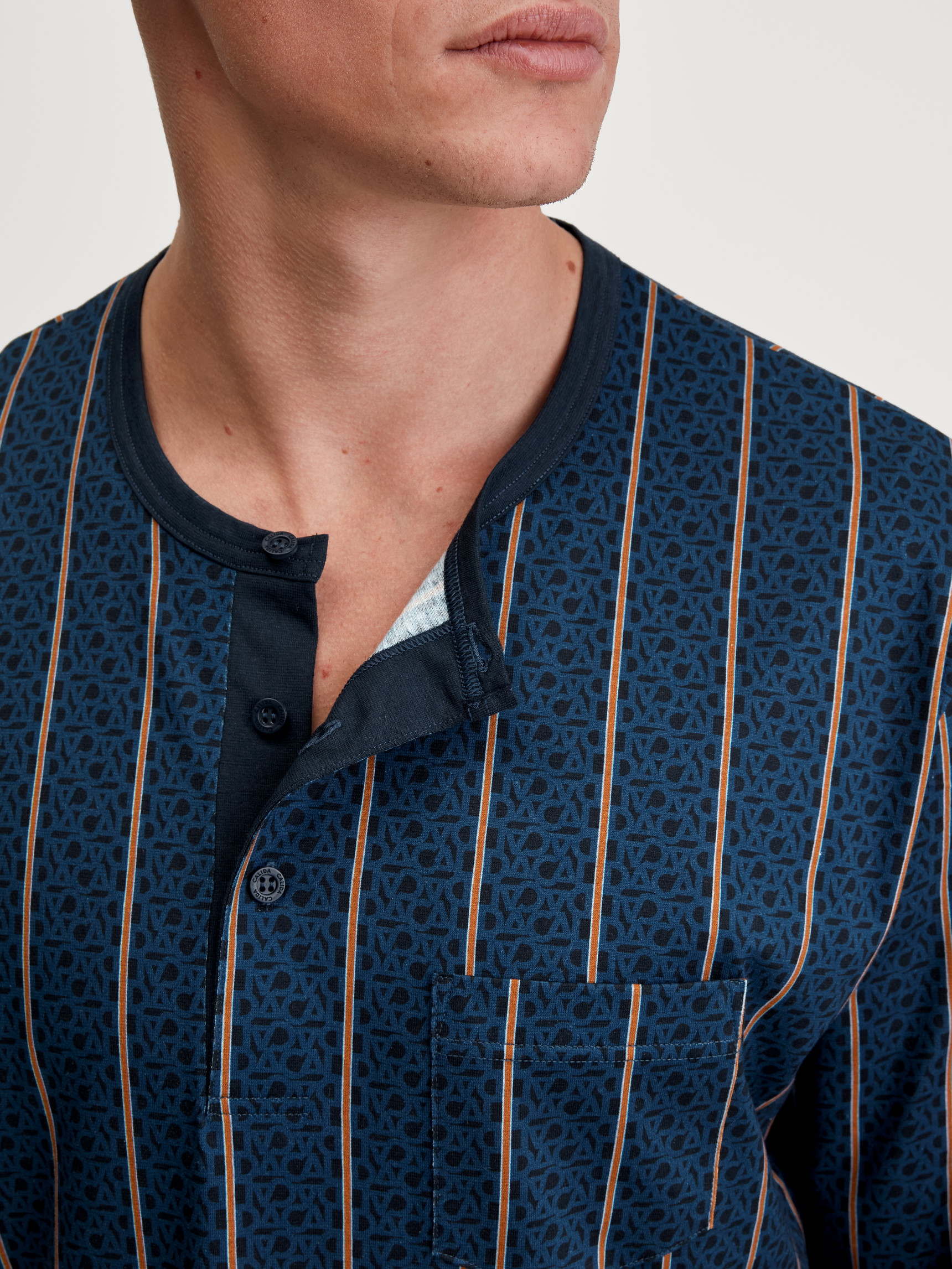 Men model is wearing Nightshirt made of 100% Cotton in Blue, Striped from the Relax Imprint 1 series by CALIDA, Detail