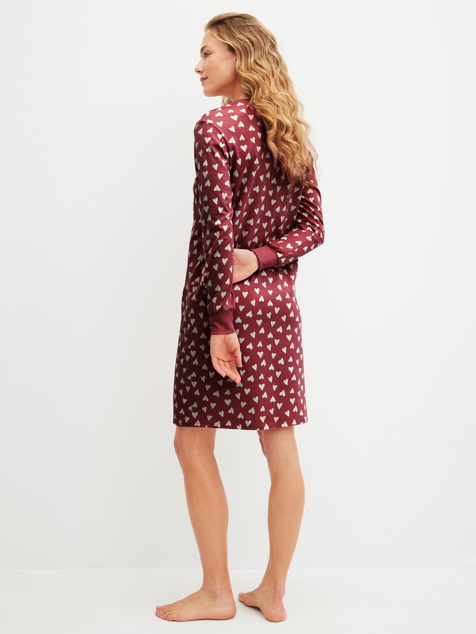 Women model is wearing Long Sleeve Nightdress – 100 cm Length made of 100% Cotton in Red, Patterned from the Cotton Special series by CALIDA, Back view