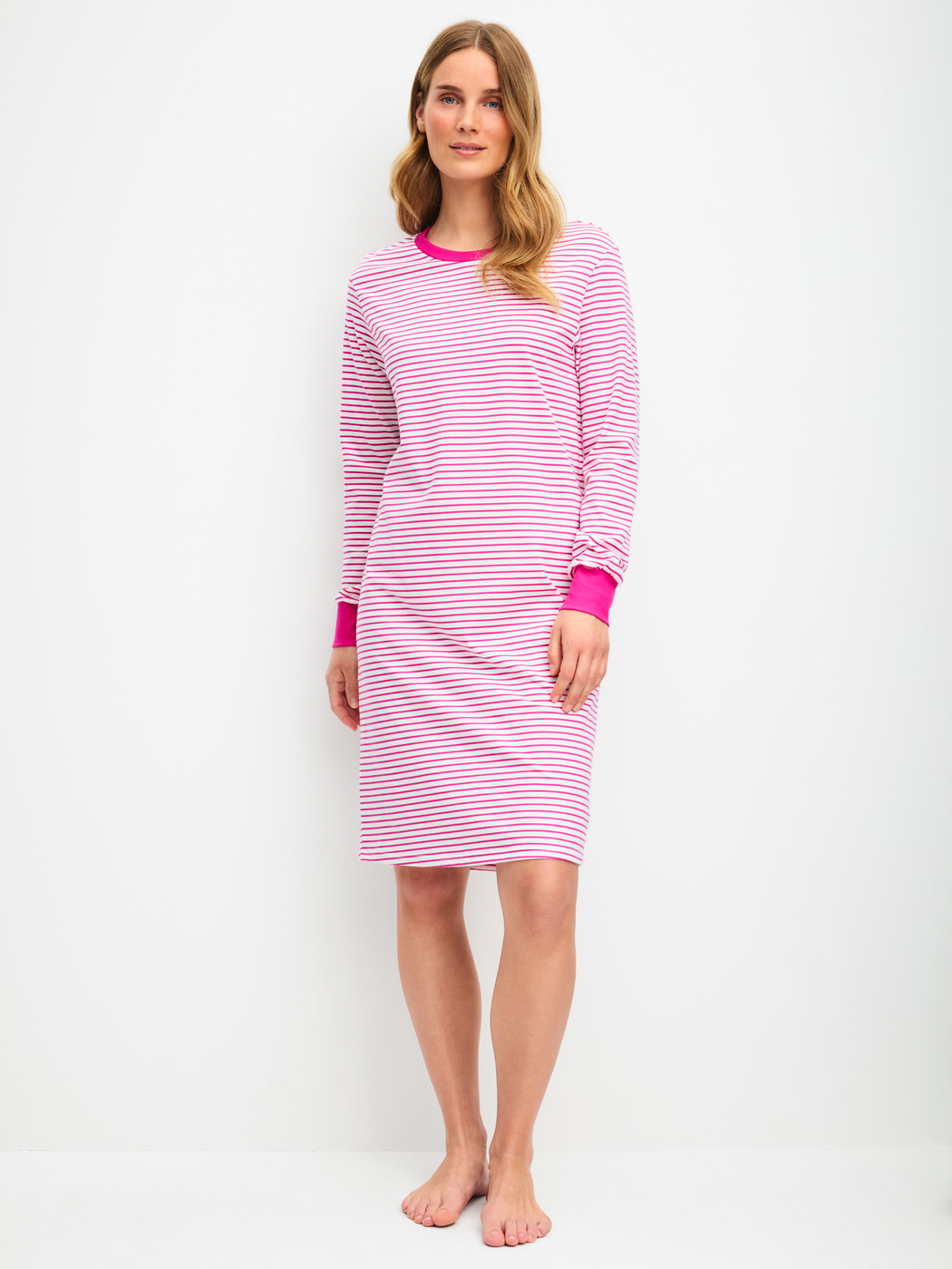 Women model is wearing Long Sleeve Nightdress – 100 cm Length made of 100% Cotton in Red, Patterned from the Cotton Special series by CALIDA, Front view