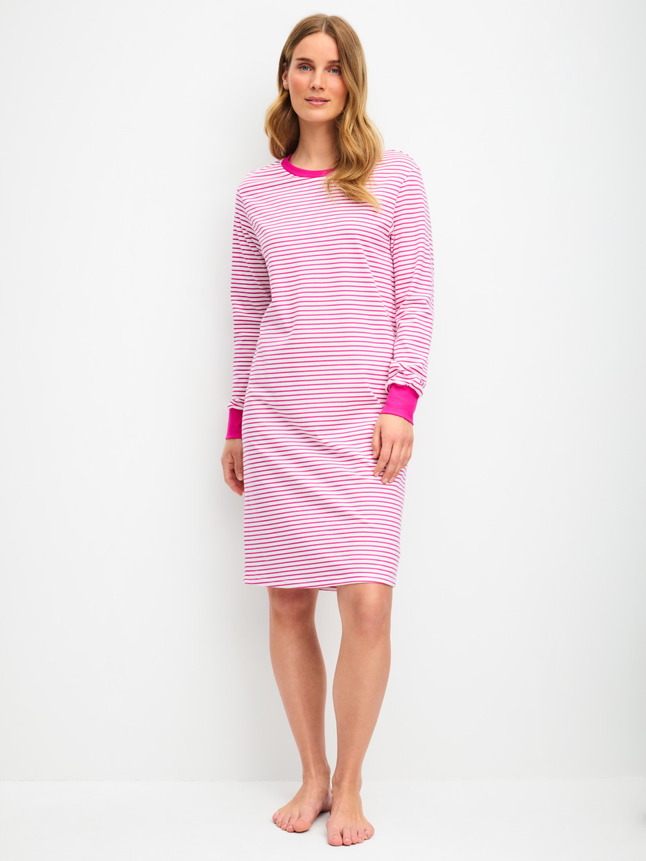 Women model is wearing Long Sleeve Nightdress – 100 cm Length made of 100% Cotton in Red, Patterned from the Cotton Special series by CALIDA, Front view