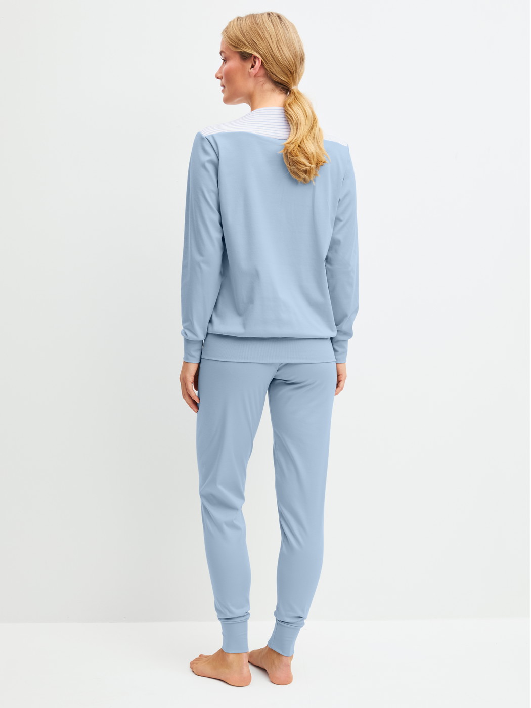 Women model is wearing Pyjama with cuff made of 100% Cotton in Grey, Striped from the Soulmate series by CALIDA, Back view