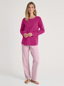 Women model is wearing Pyjamas, long made of 100% Cotton in Red, Patterned from the Cotton Special series by CALIDA, Front view