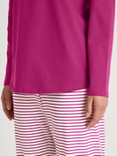 Women model is wearing Pyjamas, long made of 100% Cotton in Red, Patterned from the Cotton Special series by CALIDA, Detail