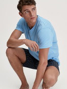 Men model is wearing Short pyjama made of 100% Cotton in Blue, Patterned from the Relax Streamline series by CALIDA, Front view