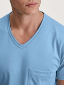 Men model is wearing Short pyjama made of 100% Cotton in Blue, Patterned from the Relax Streamline series by CALIDA, Detail