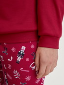 Women model is wearing Pyjama with cuff made of 100% Cotton in Red, Patterned from the Family & Friends series by CALIDA, Detail