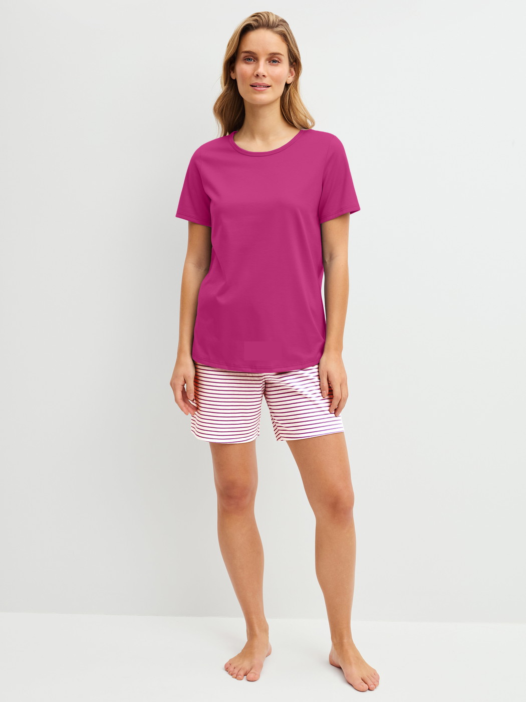 Women model is wearing Short pyjama made of 100% Cotton in Red, Patterned from the Cotton Special series by CALIDA, Front view