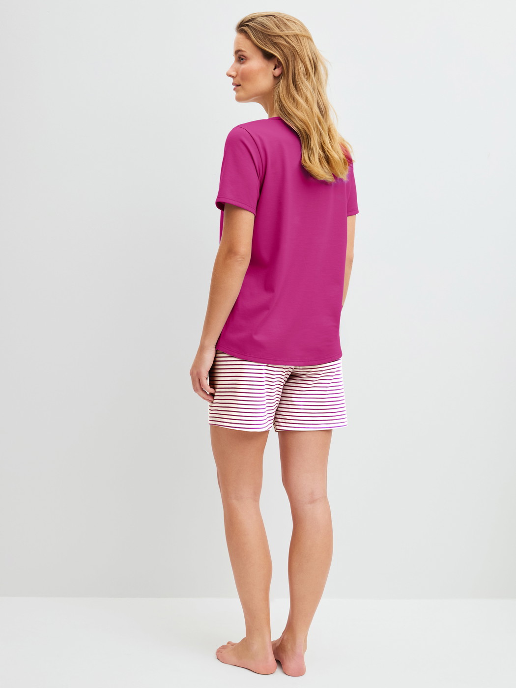 Women model is wearing Short pyjama made of 100% Cotton in Red, Patterned from the Cotton Special series by CALIDA, Back view