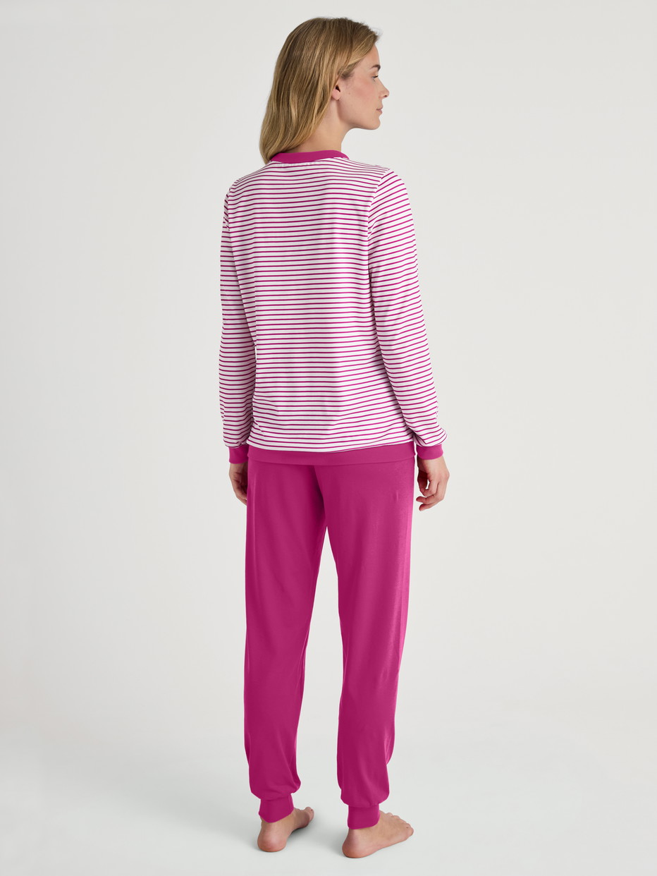 Women model is wearing Pyjama with cuff made of 100% Cotton in Pink, Patterned from the Cotton Special series by CALIDA, Back view