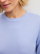 Women model is wearing Pyjama with cuff made of 100% Cotton in Blue, Patterned from the EDITION 85 series by CALIDA, Detail