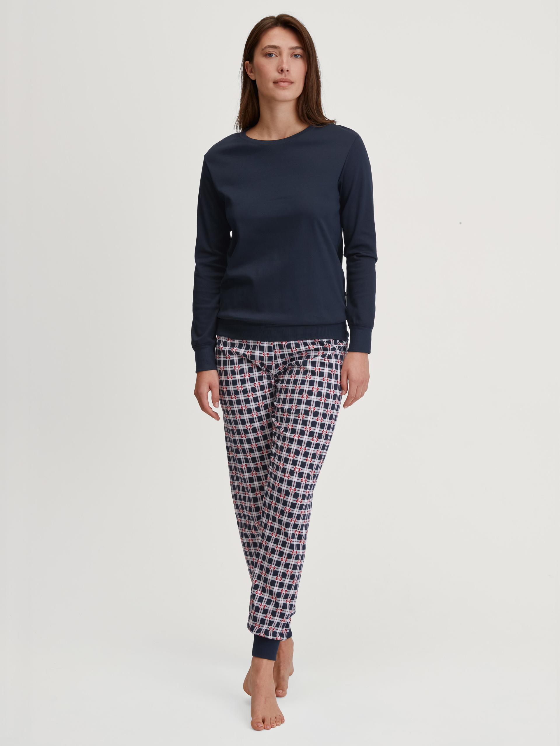 Women model is wearing Pyjama with cuff made of 100% Cotton in Blue, Checked from the Family & Friends series by CALIDA, Front view