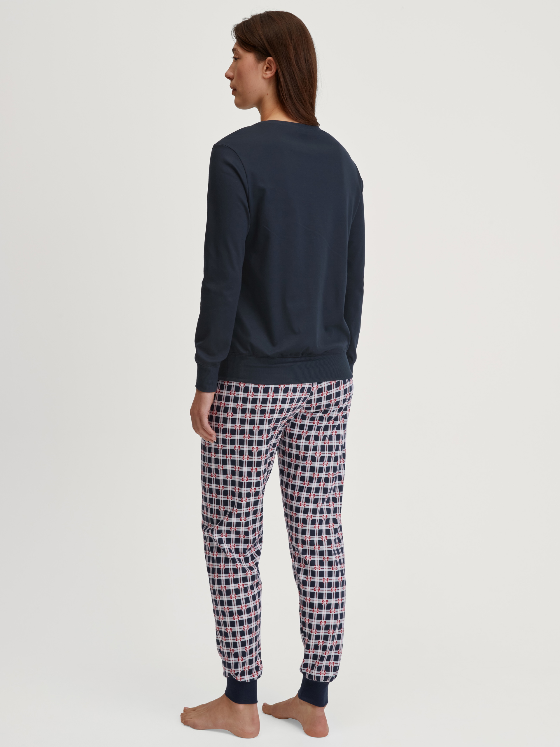 Women model is wearing Pyjama with cuff made of 100% Cotton in Blue, Checked from the Family & Friends series by CALIDA, Back view