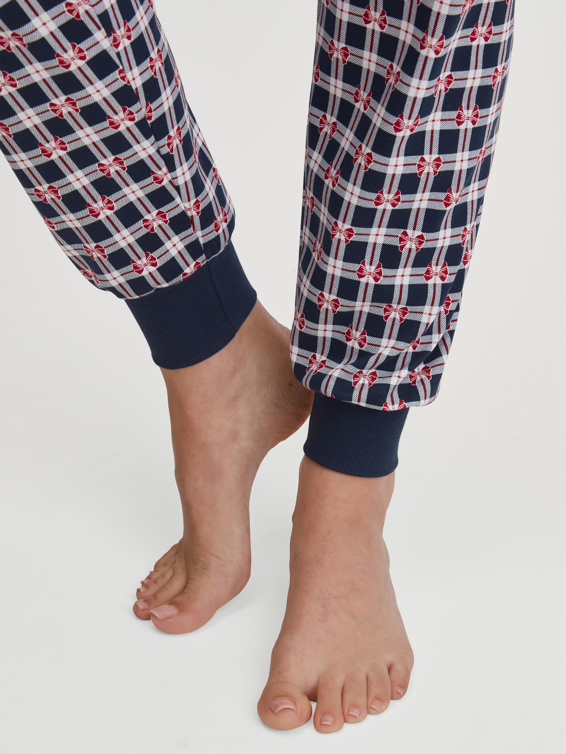 Women model is wearing Pyjama with cuff made of 100% Cotton in Blue, Checked from the Family & Friends series by CALIDA, Detail