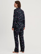 Women model is wearing Button-Up Pyjama made of 100% Cotton in Blue, Patterned from the Family & Friends series by CALIDA, Back view