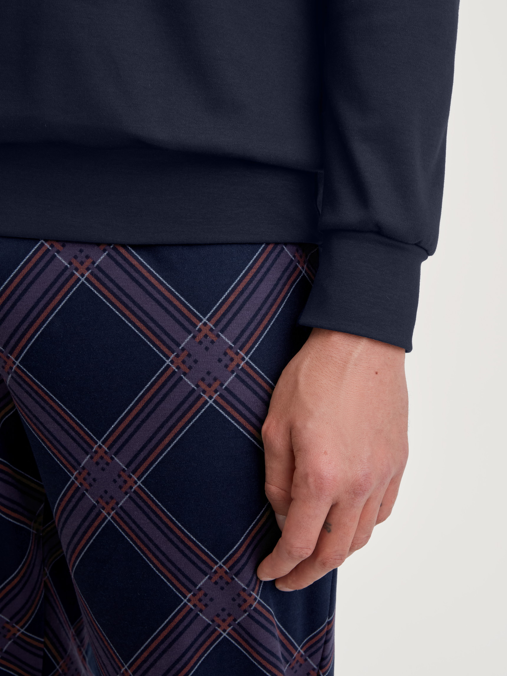 Men model is wearing Pyjama with cuff made of 100% Cotton in Blue, Patterned from the Relax Comfy 4 series by CALIDA, Detail