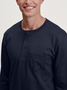 Men model is wearing Pyjama with cuff made of 100% Cotton in Blue, Patterned from the Relax Comfy 4 series by CALIDA, Detail