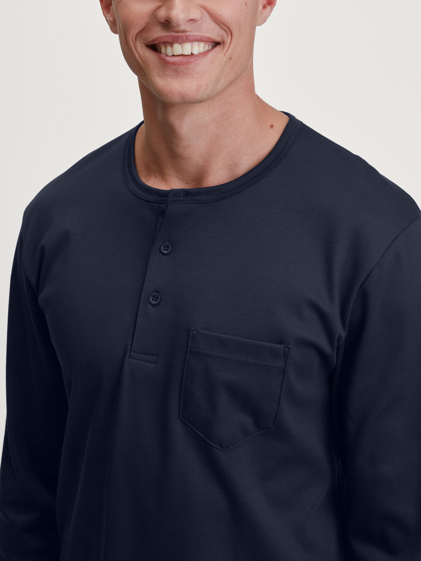 Men model is wearing Pyjama with cuff made of 100% Cotton in Blue, Patterned from the Relax Comfy 4 series by CALIDA, Detail