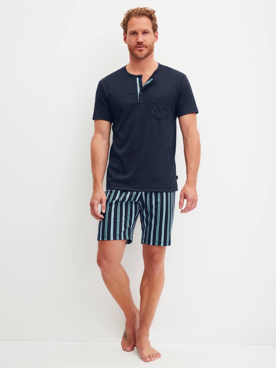 Men model is wearing Short pyjama made of 100% Cotton in Blue, Striped from the Relax Choice series by CALIDA, Front view