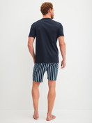 Men model is wearing Short pyjama made of 100% Cotton in Blue, Striped from the Relax Choice series by CALIDA, Back view