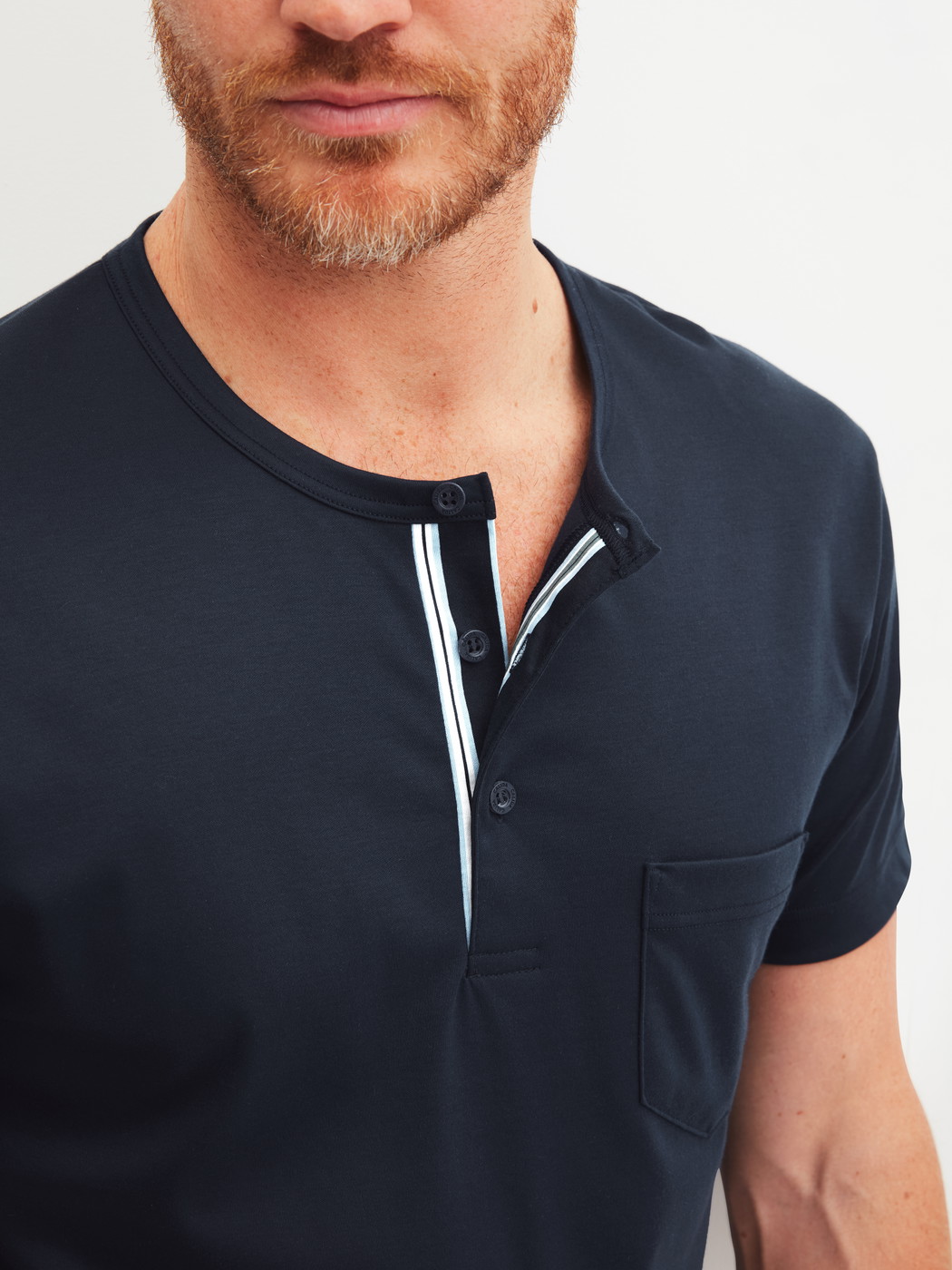 Men model is wearing Short pyjama made of 100% Cotton in Blue, Striped from the Relax Choice series by CALIDA, Detail