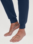Men model is wearing Pyjama with cuff made of 100% Cotton in Blue, Motif from the Relax Ski Resort series by CALIDA, Detail