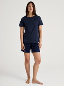Women model is wearing Short pyjama made of 100% Cotton in Blue, Patterned from the Sweet Dreams series by CALIDA, Outfit