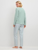 Women model is wearing Pyjamas, long made of 100% Cotton in Turquoise, Patterned from the Sweet Dreams series by CALIDA, Back view