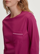 Women model is wearing Pyjama with cuff made of 100% Cotton in Purple, Floral from the Sweet Dreams series by CALIDA, Detail