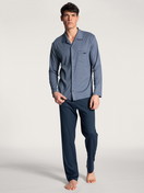 Men model is wearing Pyjama buttoned made of 100% Cotton in Blue, Checked from the Relax Choice series by CALIDA, Front view