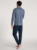 Men model is wearing Pyjama buttoned made of 100% Cotton in Blue, Checked from the Relax Choice series by CALIDA, Back view