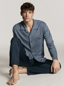 Men model is wearing Pyjama buttoned made of 100% Cotton in Blue, Checked from the Relax Choice series by CALIDA, Front view