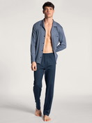 Men model is wearing Pyjama buttoned made of 100% Cotton in Blue, Checked from the Relax Choice series by CALIDA, Front view