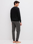 Men model is wearing  made of 100% Cotton in Black, Patterned from the Relax Cosy Vibes 4 series by CALIDA, Back view