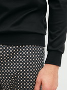 Men model is wearing  made of 100% Cotton in Black, Patterned from the Relax Cosy Vibes 4 series by CALIDA, Detail