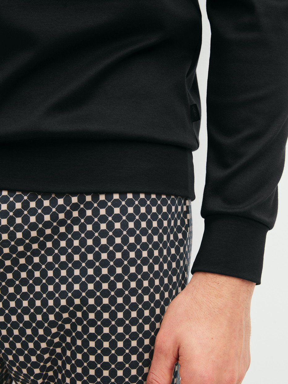 Men model is wearing  made of 100% Cotton in Black, Patterned from the Relax Cosy Vibes 4 series by CALIDA, Detail