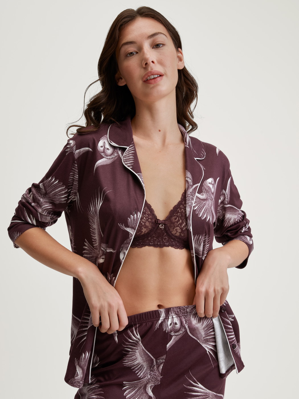 Women model is wearing Button-through pyjamas made from TENCEL™ modal and silk made of Modal in Red, Floral from the Moonlight Dreams series by CALIDA, Front view