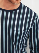 Men model is wearing cuffed pyjamas made of 100% Cotton in Blue, Striped from the Relax Choice series by CALIDA, Detail