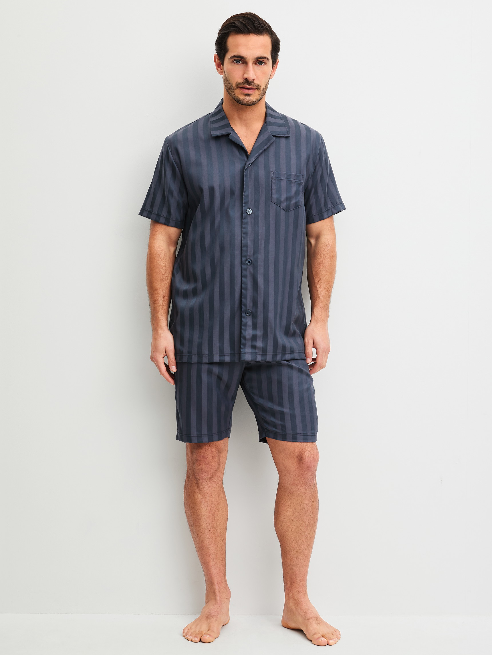 Men model is wearing Short pyjama made of Lyocell in Grey, Striped from the Relax Lux series by CALIDA, Front view