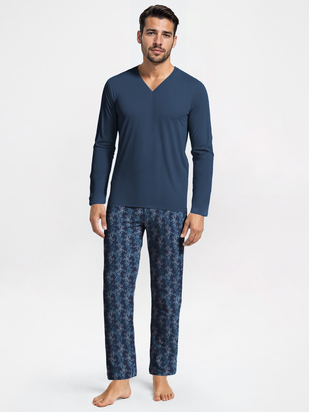 Men model is wearing Pyjamas, long made of 100% Cotton in Blue, Patterned from the Nightwear Xtra series by CALIDA, Front view, AI-generated image