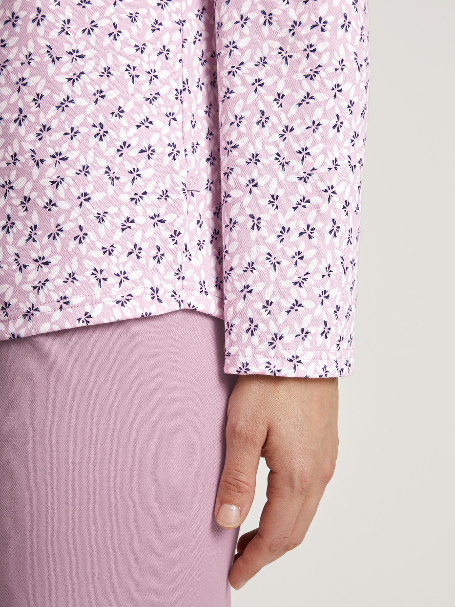 Women model is wearing Pyjamas, long made of 100% Cotton in Purple, Floral from the Midnight Flowers series by CALIDA, Detail