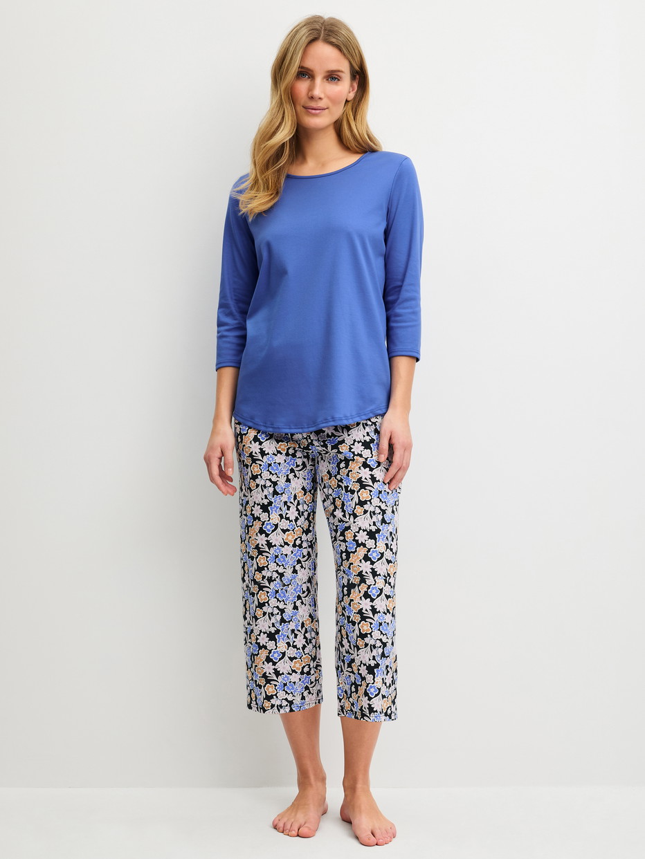 Women model is wearing  made of 100% Cotton in Blue, Patterned from the Flower Dreams series by CALIDA, Front view
