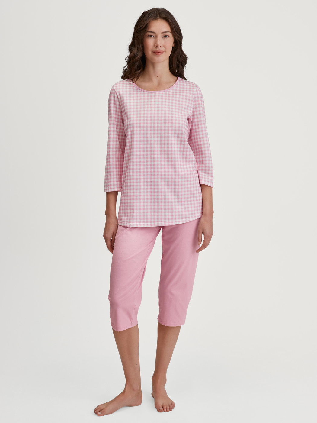 Women model is wearing 3/4 pyjamas made of 100% Cotton in Pink, Checked from the Cotton Special series by CALIDA, Front view