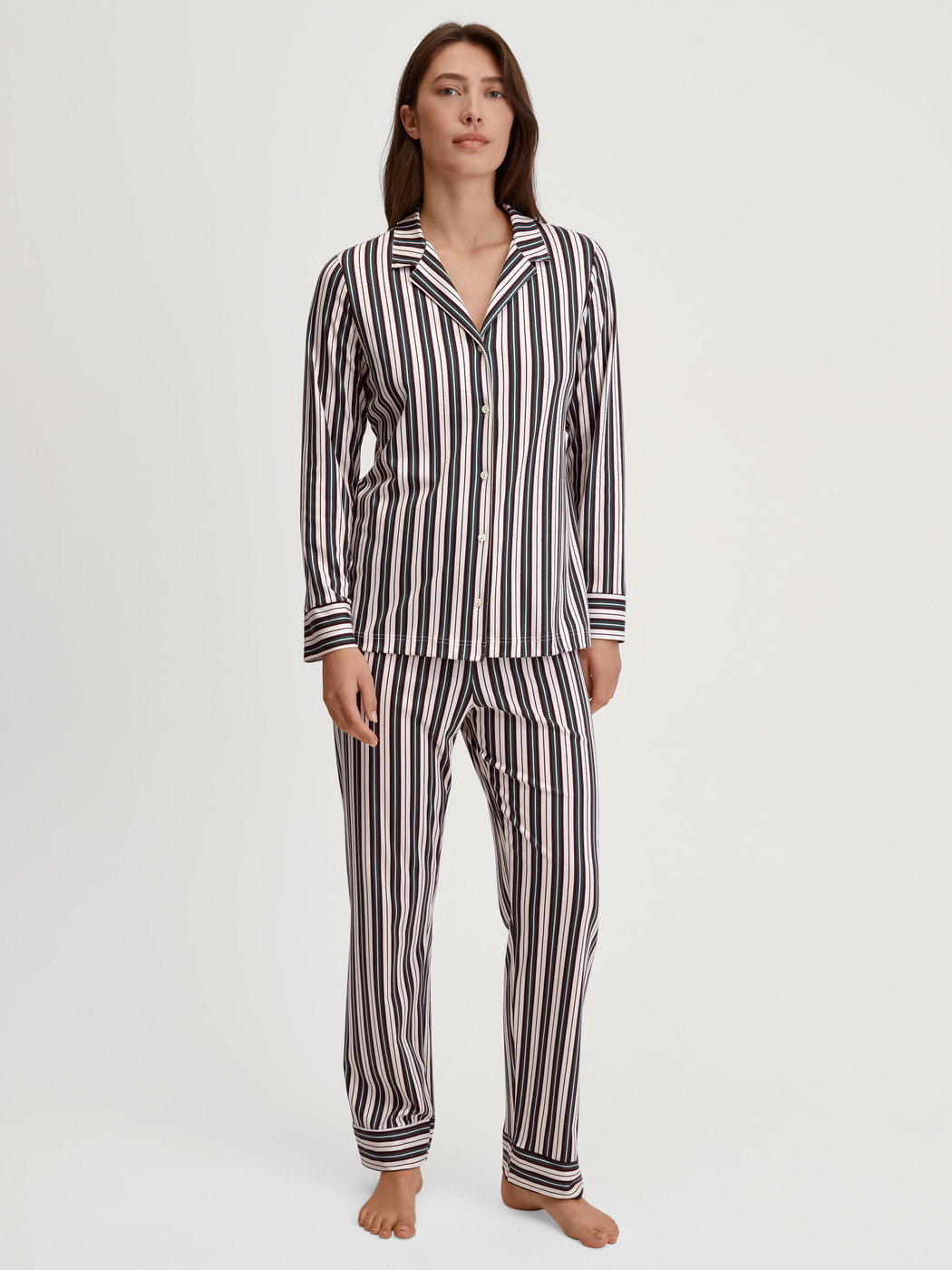 Women model is wearing Button-Up Pyjama made of 100% Cotton in Green, Striped from the Night Lovers series by CALIDA, Front view