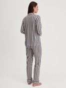Women model is wearing Button-Up Pyjama made of 100% Cotton in Green, Striped from the Night Lovers series by CALIDA, Back view