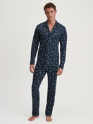 Men model is wearing Button-Up Pyjama made of 100% Cotton in Blue, Patterned from the Relax Swiss Resort series by CALIDA, Front view