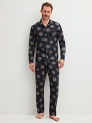 Men model is wearing Button-Up Pyjama made of 100% Cotton in Blue, Patterned from the EDITION 85 series by CALIDA, Front view