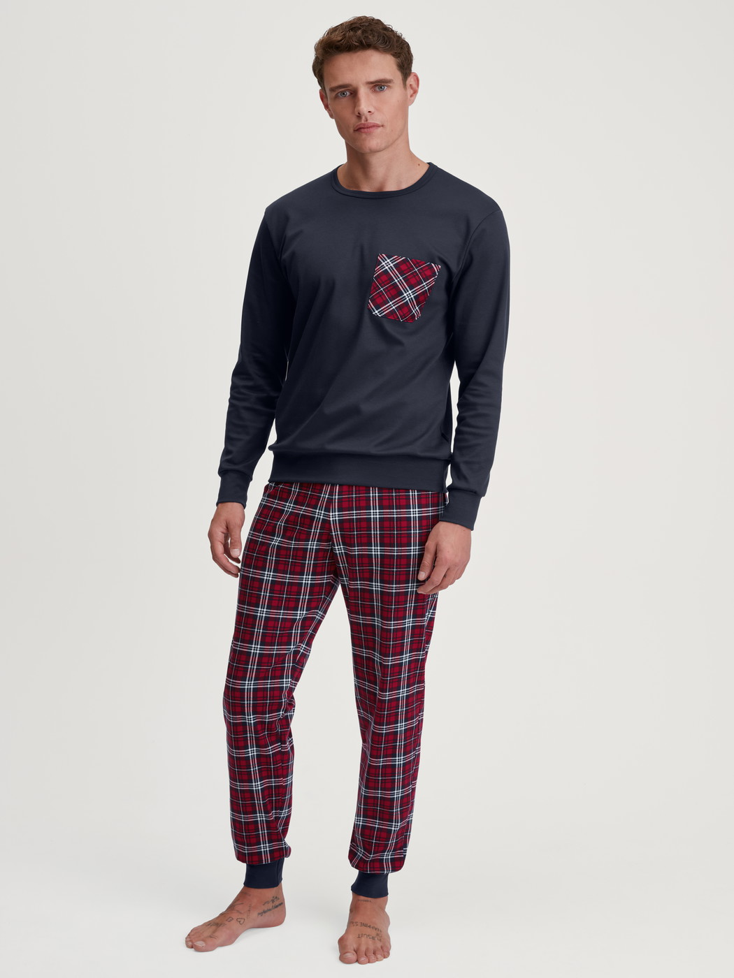 Men model is wearing Pyjama with cuff made of 100% Cotton in Blue, Checked from the Family & Friends series by CALIDA, Front view