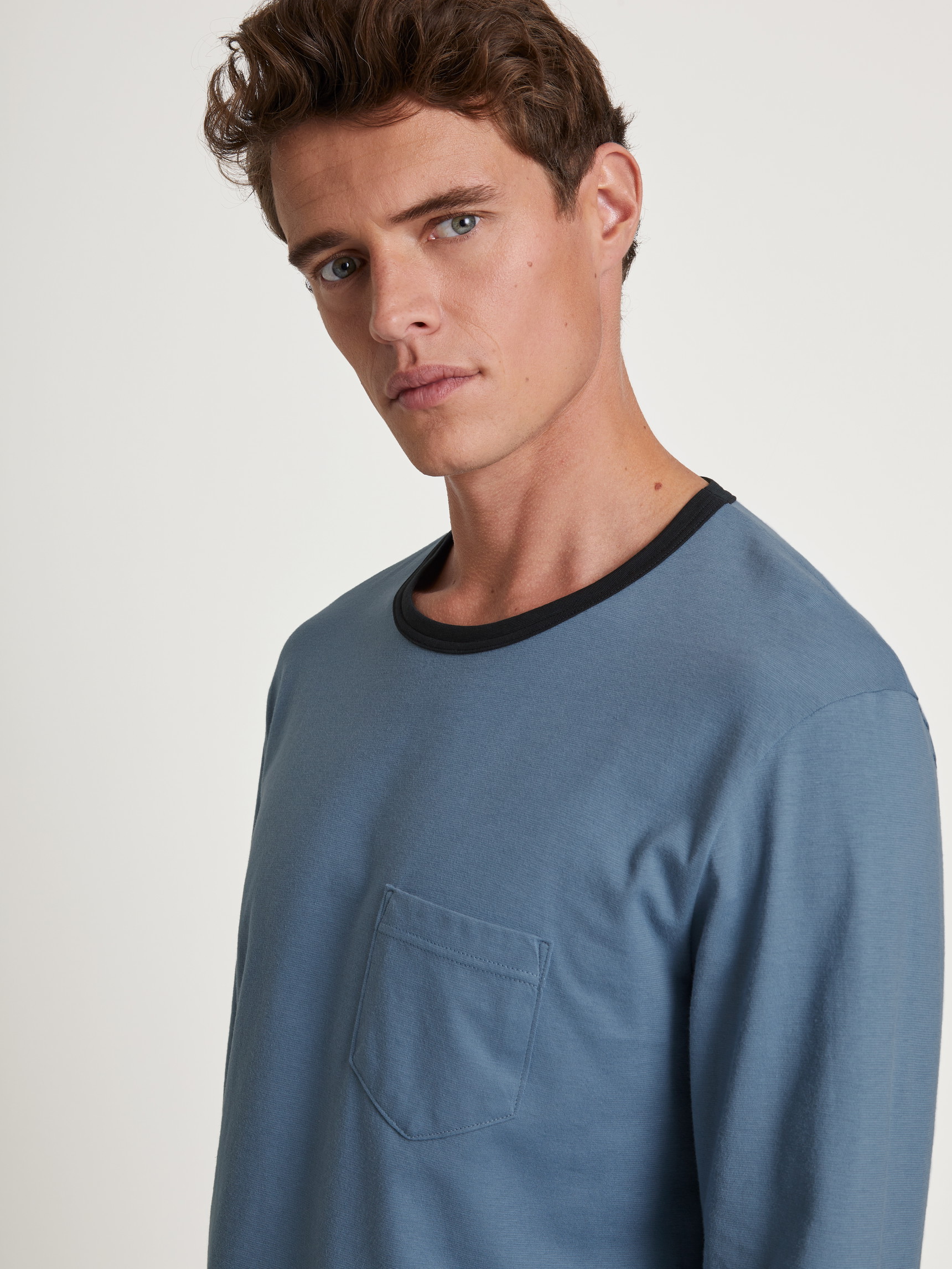 Men model is wearing Pyjama made of 100% Cotton in Blue, Unicoloured from the Relax Essentials series by CALIDA, Detail